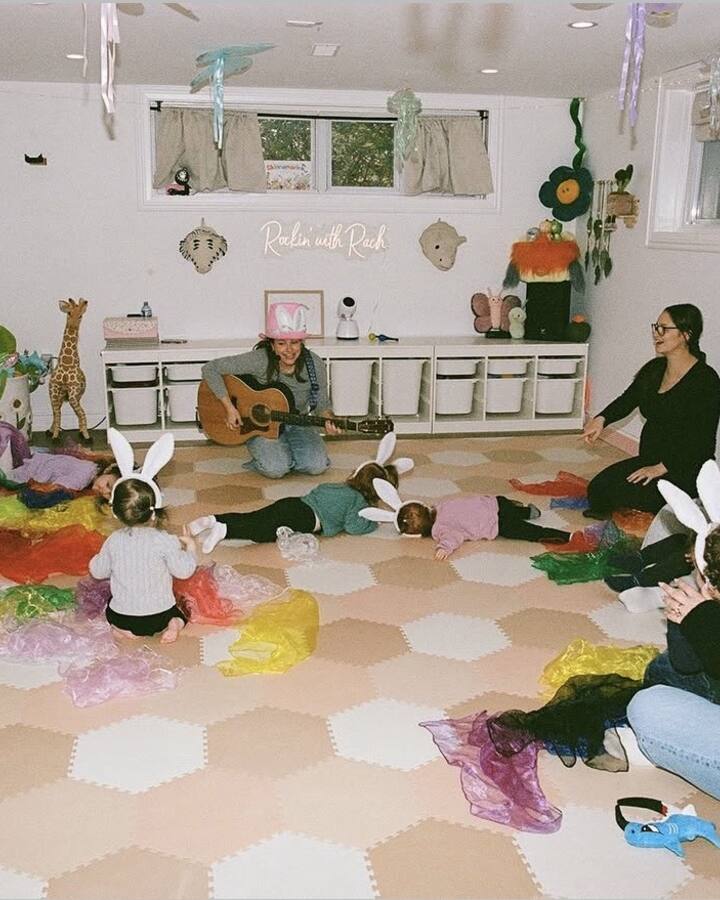 Rachel Kornblum, the children's musician known as Rockin' Rach, laughing in her kitchen.