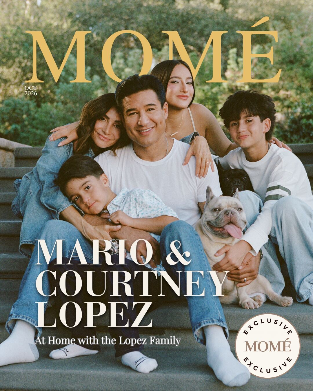 Momé October 2026 cover &mdash; Mario and Courtney Lopez sit on garden steps with their three children and two French bulldogs, all in denim and white, beneath the cover lines &lsquo;Mario & Courtney Lopez&rsquo; and &lsquo;At Home with the Lopez Family&rsquo;, with a Momé Exclusive seal.