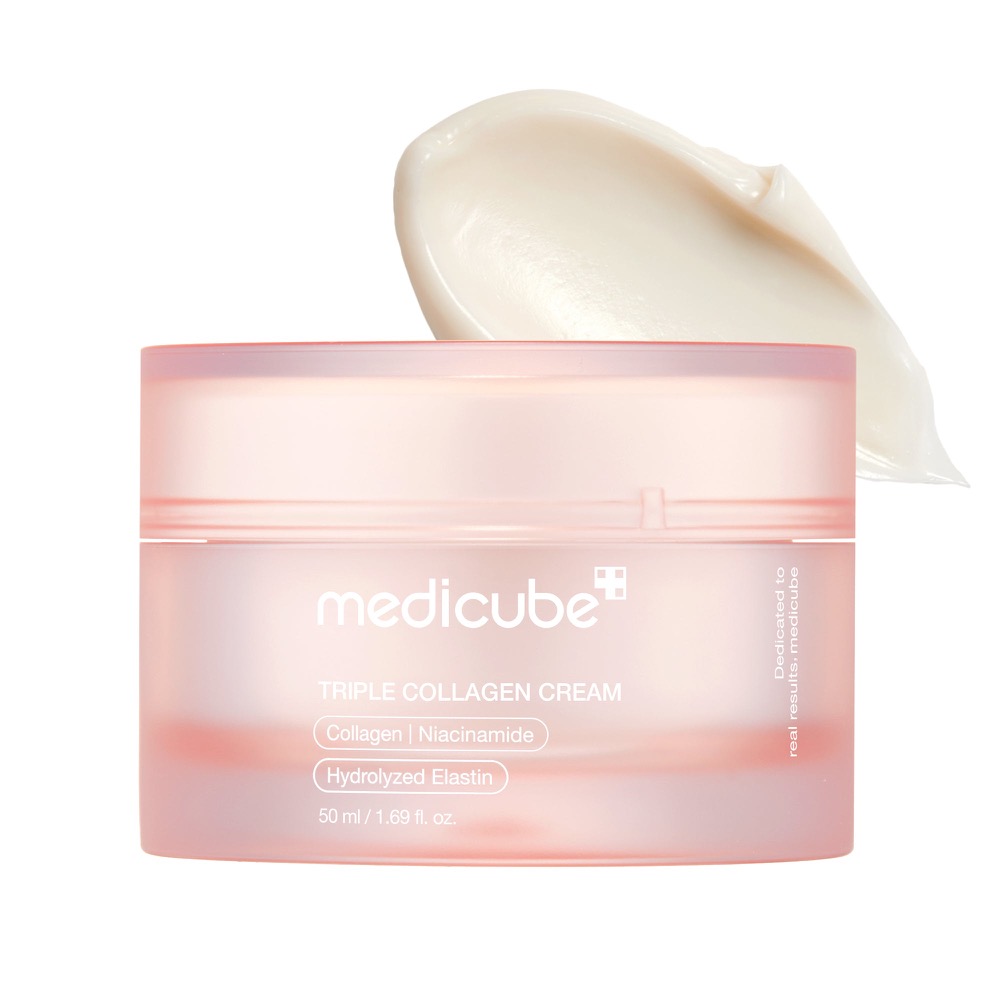 A frosted pink 50ml jar of Medicube Triple Collagen Cream with its lid tilted open, a swipe of the ivory cream behind it.