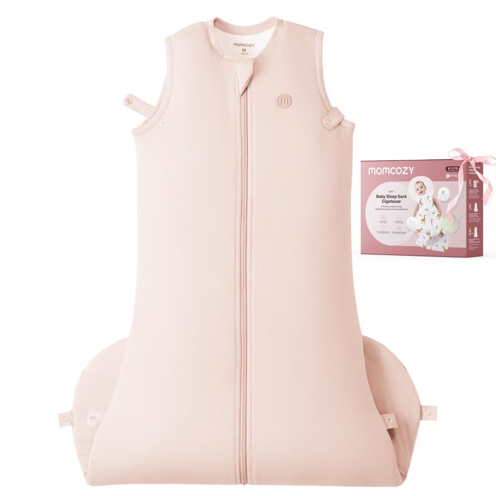 The Momcozy baby sleep sack in blush pink, a sleeveless zip-front bamboo sack with adjustable snap tabs, shown beside its packaging.